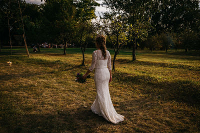 Woman standing on field