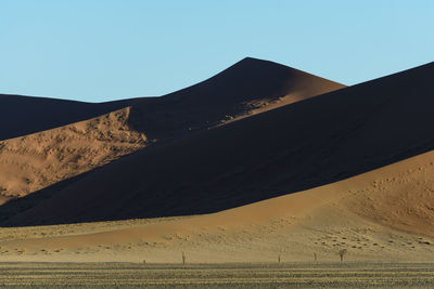 View of desert against clear sky