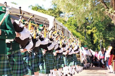 Musicians playing bagpipes during event