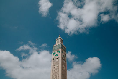 Low angle view of clock tower against sky