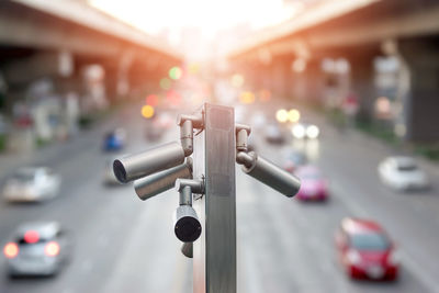 Closeup of traffic security camera surveillance cctv on the road in the big city.