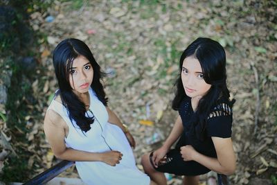 Portrait of young woman standing outdoors