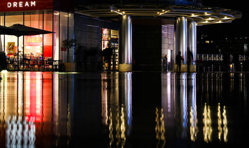 Reflection of illuminated building