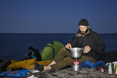 View of tourist camping at sea