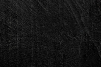 Full frame shot of rock on black background