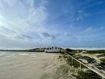 Scenic view of beach against sky