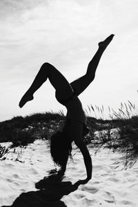 Man standing on snow covered landscape