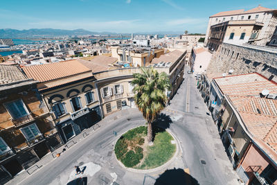 High angle view of street amidst buildings in city