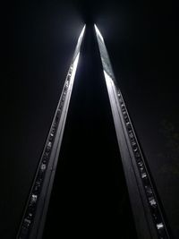 Low angle view of illuminated lamp against sky