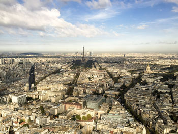 High angle view of city against cloudy sky