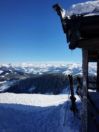 Scenic view of snow covered mountain against sky