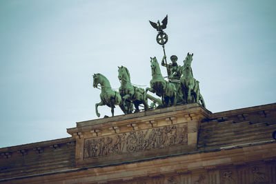 Low angle view of statue against clear sky