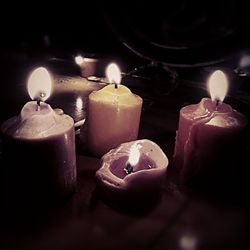 Close-up of lit candle