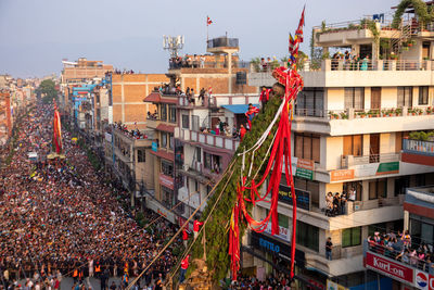 Devotees pull chariots as they take part in the festivities to mark the rato machindranath chariot.