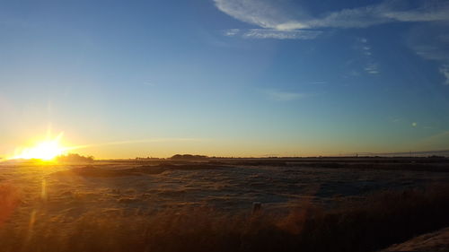 Scenic view of sunset against sky