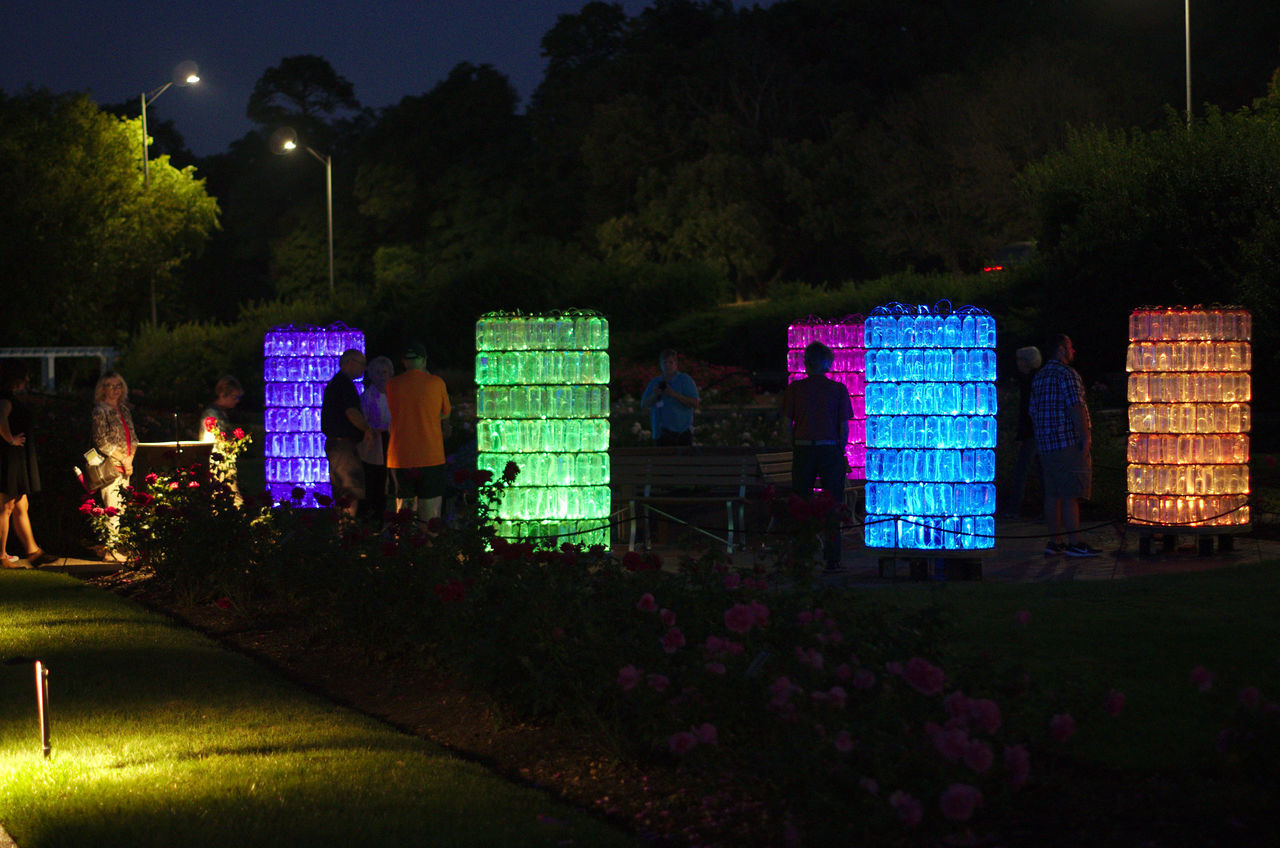 VIEW OF ILLUMINATED PARK IN CITY