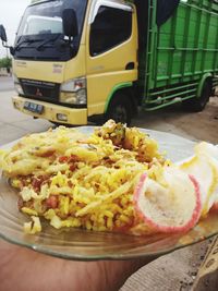 Close-up of hand holding food