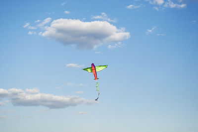 Low angle view of kite flying in sky