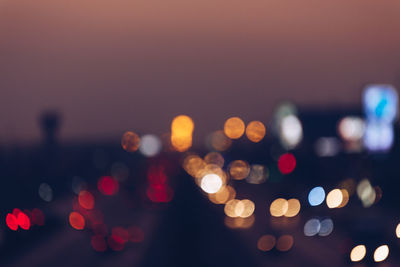 Defocused image of illuminated lights at night