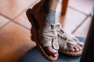 Tattoos and sandals