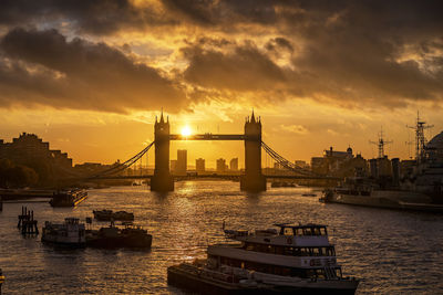 View of bridge over river in city