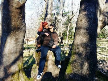 Couple kissing on field