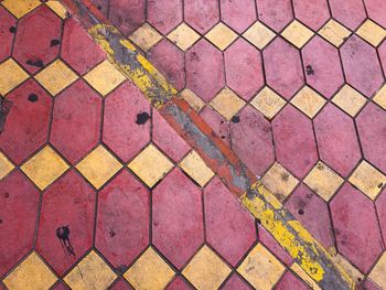 High angle view of paving stones on footpath