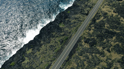 High angle view of road by sea