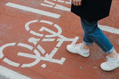 Pedestrian walking on bicycle lane