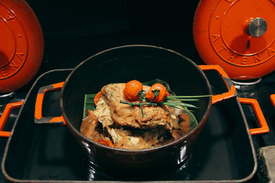 High angle view of meat in cooking pan