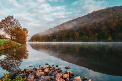 Morning fog on the saar loop near mettlach in germany.