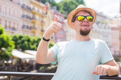 Portrait of young man wearing sunglasses