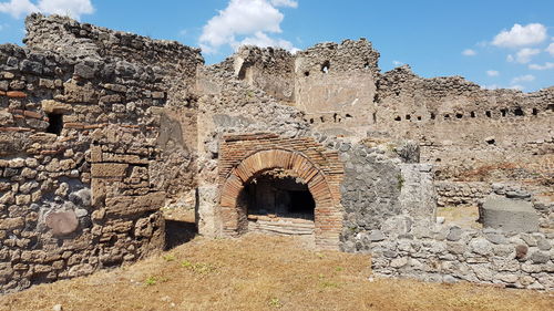 View of old ruin building against sky