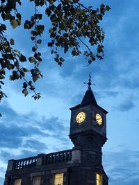 Low angle view of clock tower against sky