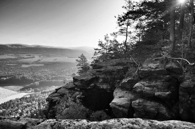 Rock formations on landscape against sky