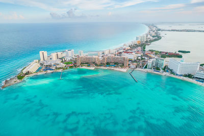 High angle view of swimming pool by sea against sky