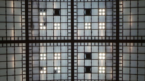 Full frame shot of illuminated lights in building