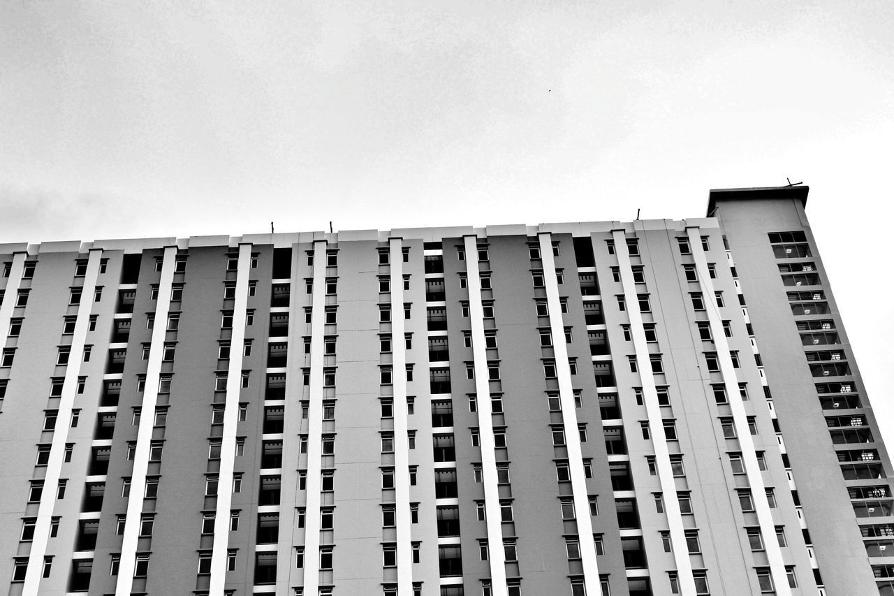 LOW ANGLE VIEW OF BUILDINGS AGAINST SKY