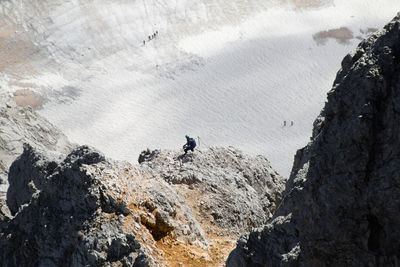 High angle view of rocks on mountain during winter