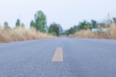 Surface level of road against sky