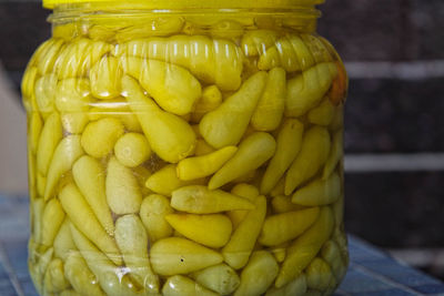 Close-up of preserves in glass jar on table