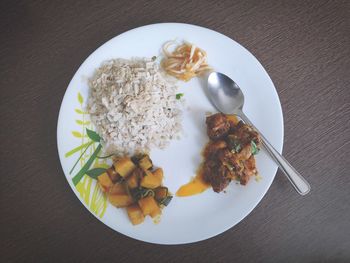 High angle view of breakfast served on table