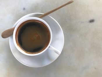High angle view of coffee cup on table
