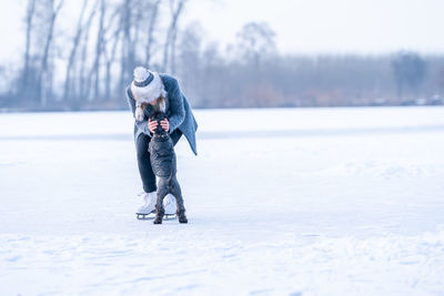 Full length of man on snowy field