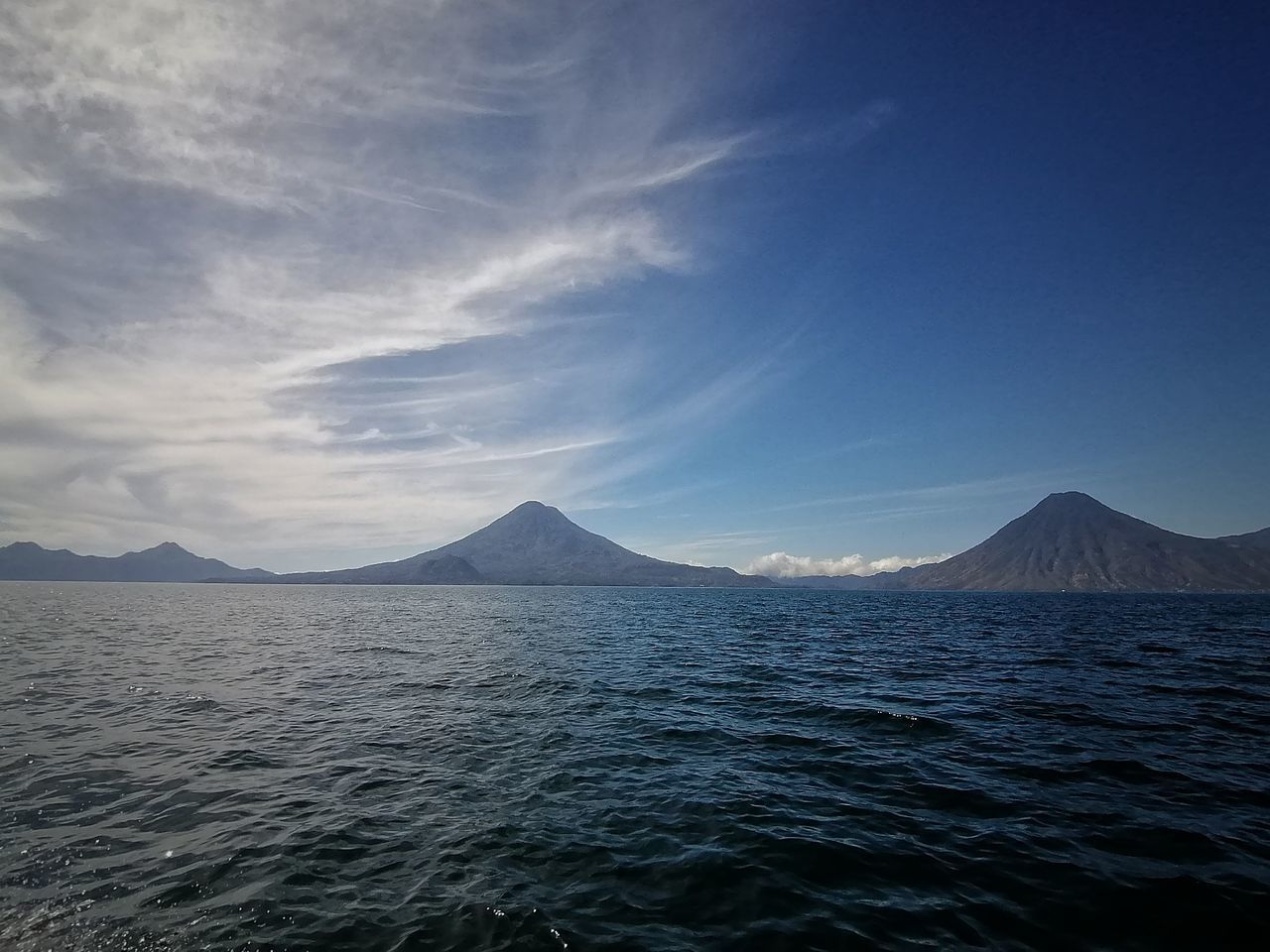 horizon, mountain, water, sky, scenics - nature, beauty in nature, sea, ocean, nature, environment, landscape, cloud, travel destinations, no people, volcano, travel, land, blue, tranquility, tranquil scene, coast, outdoors, dusk, mountain range, non-urban scene, day