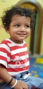 Portrait of smiling boy sitting