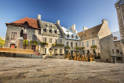 Buildings against blue sky