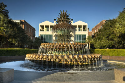 View of fountain in city buildings