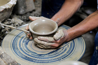 Cropped image of man working in workshop