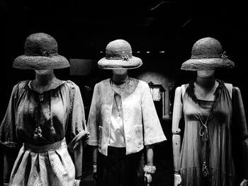 Womenswear on female mannequins at store